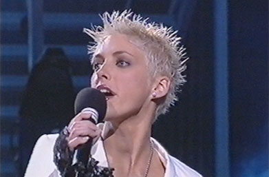 Melanie Lowe supporting beginner guitar students