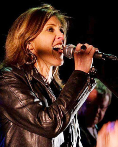 Melanie Lowe vocal coach working with beginner singers