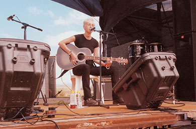 Melanie Lowe guitar teacher working with beginner students